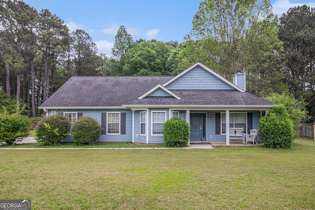 643 Lora Smith Rd, Newnan, GA 30265 - view of front of property featuring a shingled roof, a chimney, a front lawn, and a porch