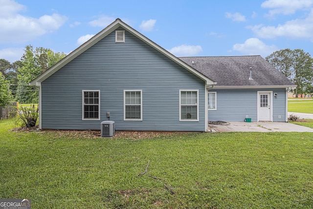 643 Lora Smith Rd, Newnan, GA 30265 - back of house with a patio, a lawn, and a shingled roof