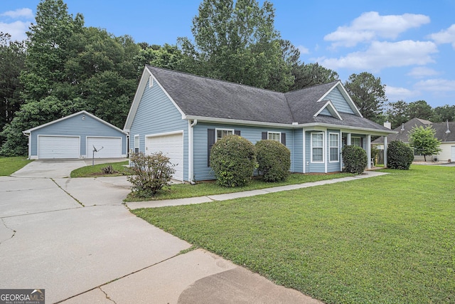643 Lora Smith Rd, Newnan, GA 30265 - view of front of property with a detached garage, a front lawn, and a shingled roof