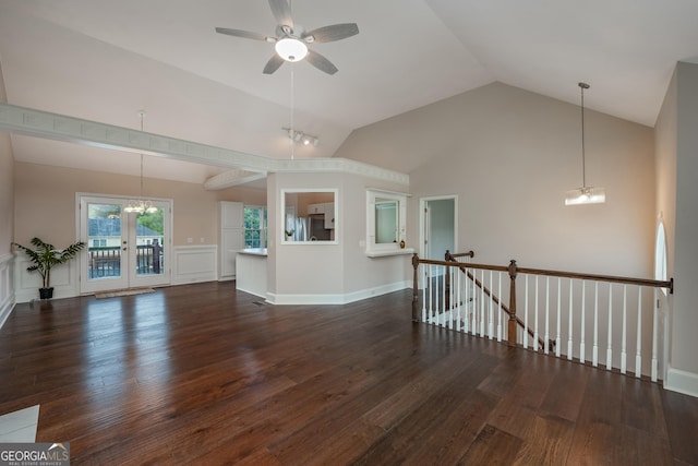102 Peaceful Vw, Acworth, GA 30102 - empty room featuring a chandelier, a ceiling fan, wood finished floors, and high vaulted ceiling