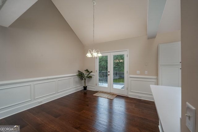 102 Peaceful Vw, Acworth, GA 30102 - unfurnished dining area featuring french doors, vaulted ceiling, dark wood finished floors, wainscoting, and a chandelier