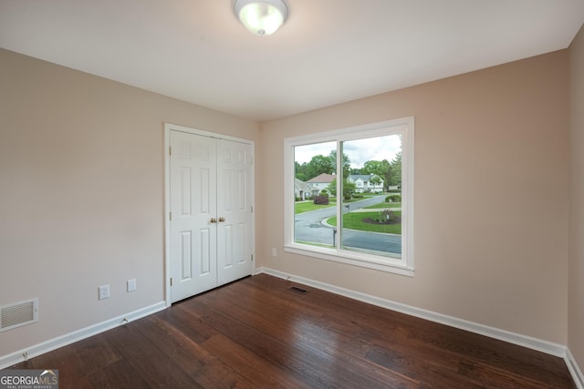 102 Peaceful Vw, Acworth, GA 30102 - unfurnished bedroom featuring dark wood finished floors and a closet