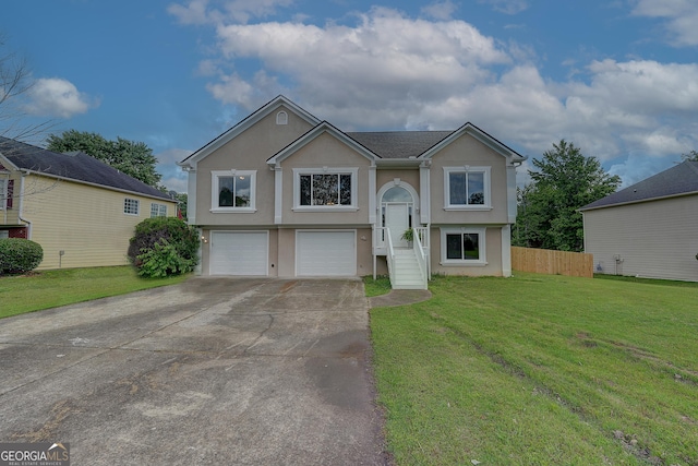 102 Peaceful Vw, Acworth, GA 30102 - split foyer home with stucco siding, driveway, and a garage