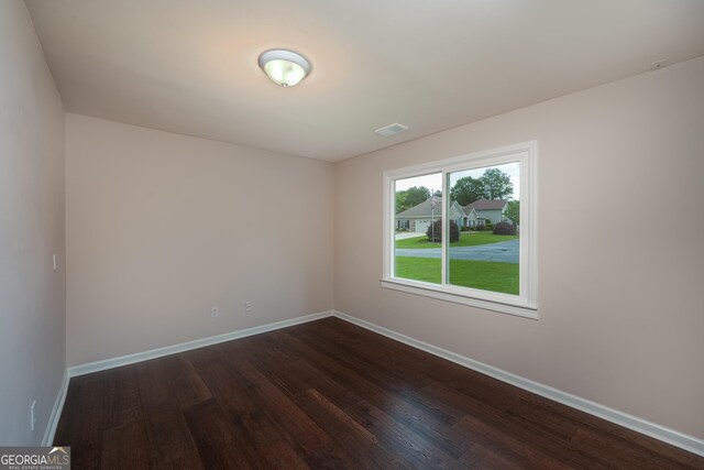 102 Peaceful Vw, Acworth, GA 30102 - spare room featuring dark wood-style floors and baseboards