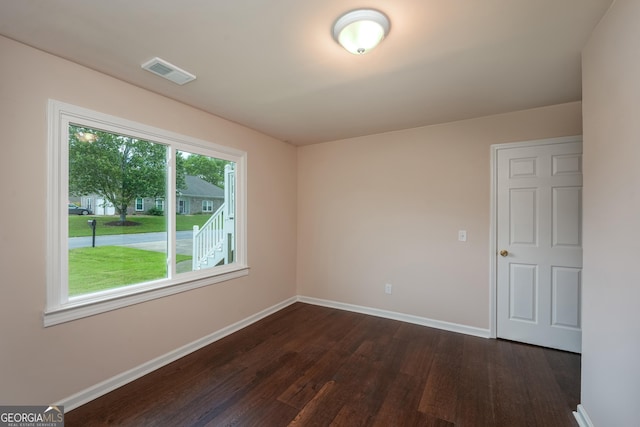 102 Peaceful Vw, Acworth, GA 30102 - spare room featuring dark wood-type flooring and baseboards