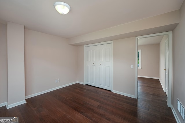 102 Peaceful Vw, Acworth, GA 30102 - unfurnished bedroom featuring dark wood-style floors and a closet