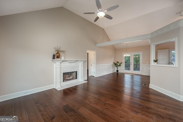 102 Peaceful Vw, Acworth, GA 30102 - unfurnished living room featuring ceiling fan, a tile fireplace, high vaulted ceiling, wood finished floors, and french doors