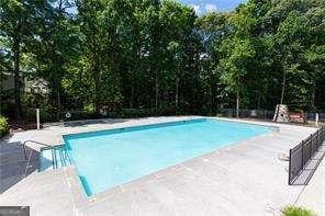 415 Morgan Falls Chase, Canton, GA 30114 - outdoor pool featuring a patio area