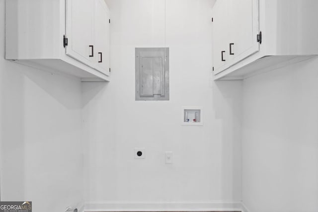4045 White Oak Ln SW, Lilburn, GA 30047 - clothes washing area with cabinet space, hookup for an electric dryer, hookup for a washing machine, and electric panel