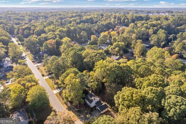4045 White Oak Ln SW, Lilburn, GA 30047 - aerial view of property and surrounding area featuring a heavily wooded area