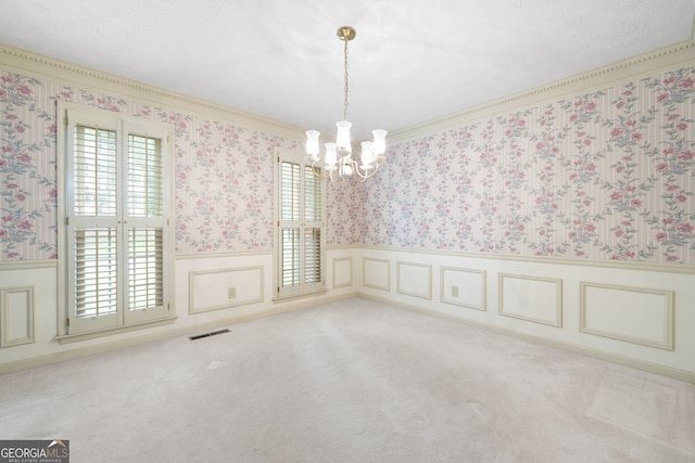 2101 Breconridge Dr SW, Marietta, GA 30064 - unfurnished room featuring a chandelier, a wainscoted wall, wallpapered walls, carpet, and crown molding