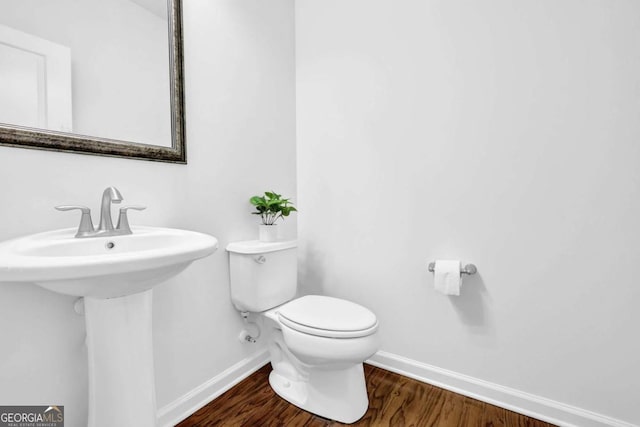 1929 Brightleaf Way, Marietta, GA 30060 - half bathroom with baseboards and wood finished floors