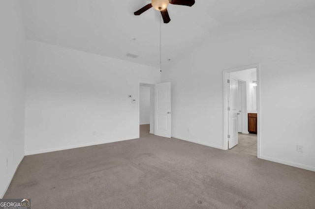 1929 Brightleaf Way, Marietta, GA 30060 - carpeted empty room with a ceiling fan and vaulted ceiling
