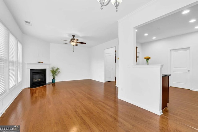 1929 Brightleaf Way, Marietta, GA 30060 - unfurnished living room featuring recessed lighting, wood finished floors, a fireplace with flush hearth, and ceiling fan