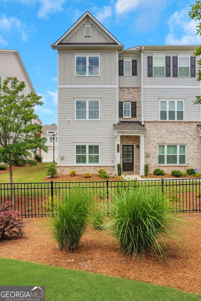 1768 Evenstad Way, Smyrna, GA 30080 - back of house featuring fence and board and batten siding