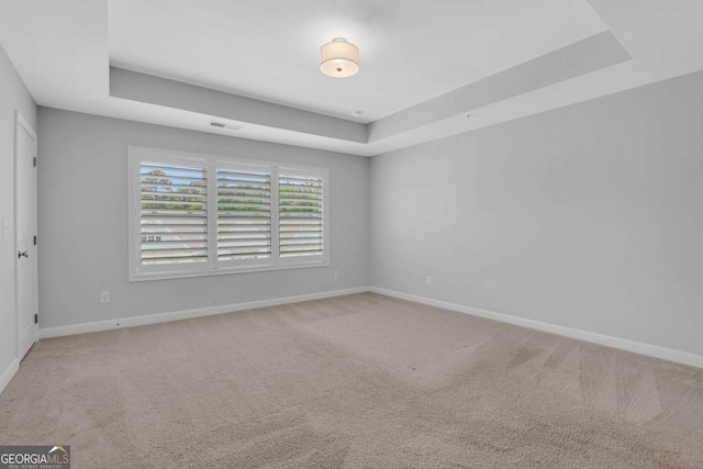 1768 Evenstad Way, Smyrna, GA 30080 - carpeted spare room with a tray ceiling and baseboards