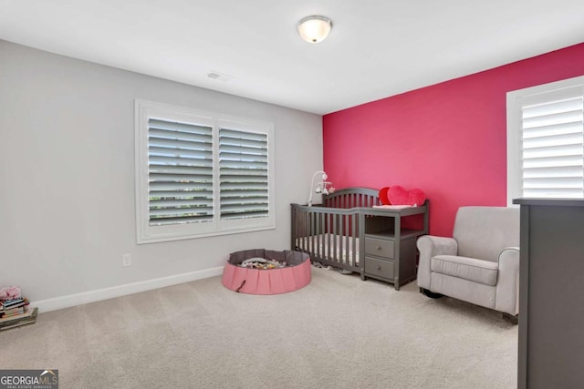 1768 Evenstad Way, Smyrna, GA 30080 - carpeted bedroom featuring baseboards, multiple windows, and a crib