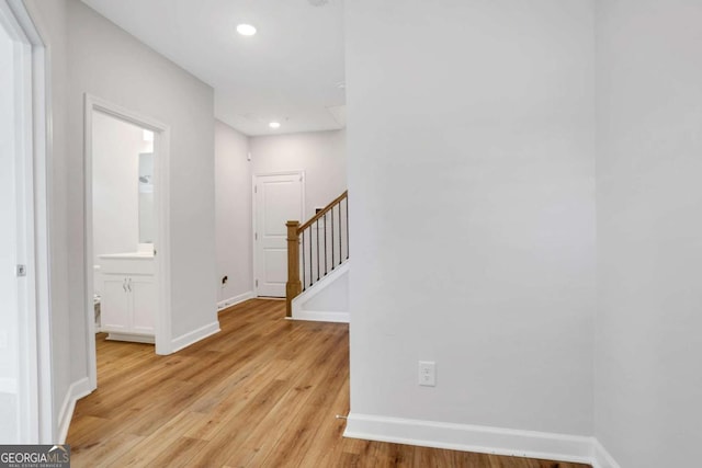 1768 Evenstad Way, Smyrna, GA 30080 - corridor with light wood-style flooring, baseboards, stairway, and recessed lighting
