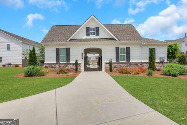 1768 Evenstad Way, Smyrna, GA 30080 - view of front of property with brick siding, a front yard, driveway, and a shingled roof