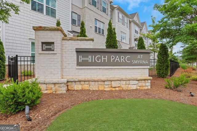1768 Evenstad Way, Smyrna, GA 30080 - community sign with fence and a residential view