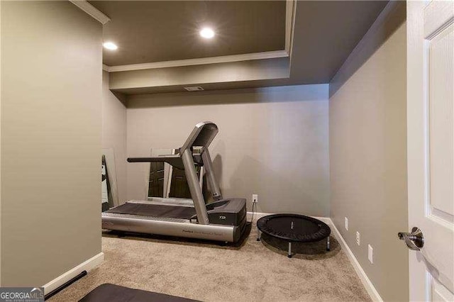 workout room with carpet, crown molding, recessed lighting, and baseboards