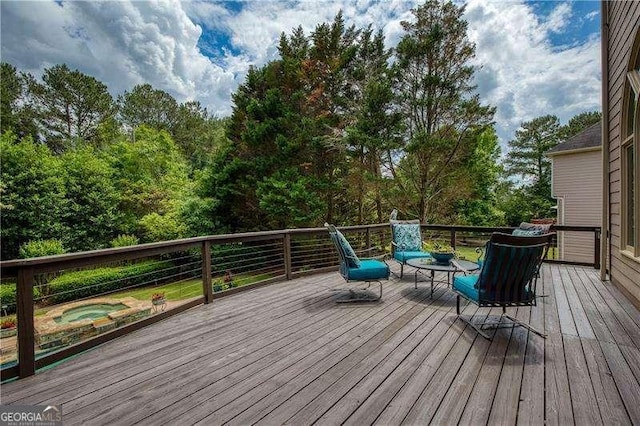 wooden terrace featuring an in-ground hot tub