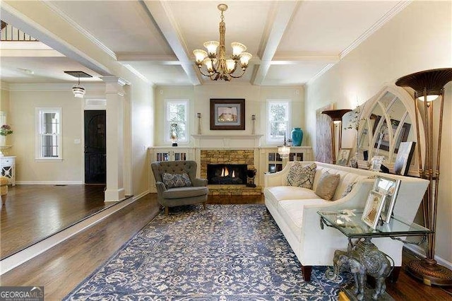 living room with wood finished floors, coffered ceiling, a fireplace, a chandelier, and beam ceiling