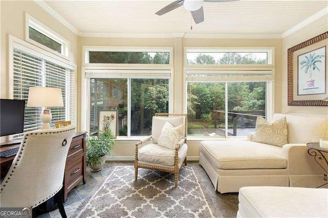 sunroom featuring ornamental molding