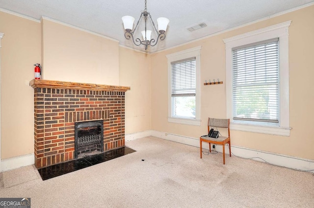 338 N Broad St, Monroe, GA 30655 - unfurnished living room featuring ornamental molding, carpet floors, a fireplace, a chandelier, and baseboards