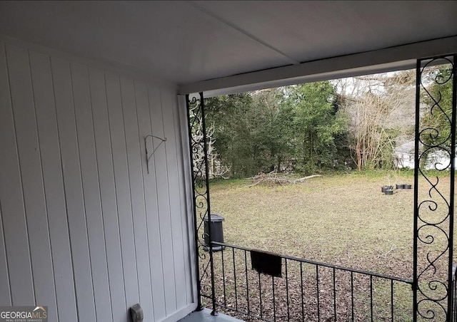 2227 Robin Hood Rd, Macon, GA 31206 - doorway to outside featuring wooden walls
