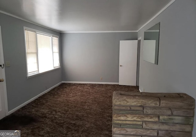 2227 Robin Hood Rd, Macon, GA 31206 - spare room with crown molding, carpet flooring, and baseboards