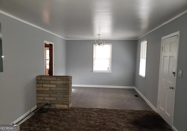 2227 Robin Hood Rd, Macon, GA 31206 - unfurnished room featuring a chandelier, ornamental molding, carpet, and baseboards