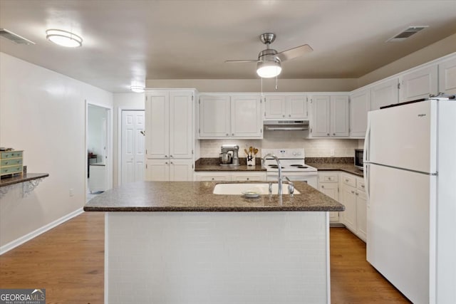 2507 Wateringhole Ct, Statesboro, GA 30458 - kitchen featuring white appliances, under cabinet range hood, a sink, white cabinetry, and a ceiling fan