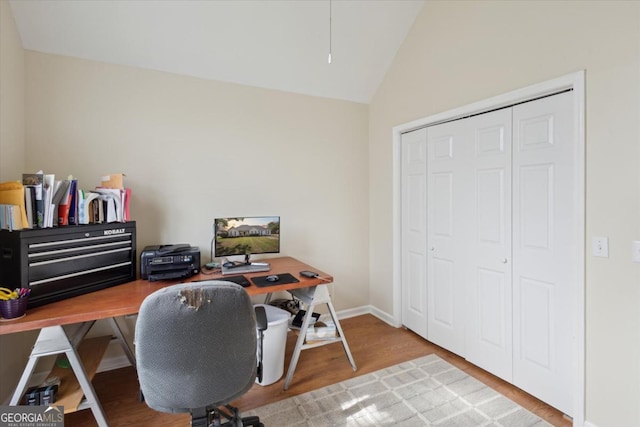 2507 Wateringhole Ct, Statesboro, GA 30458 - office area with wood finished floors, vaulted ceiling, and baseboards