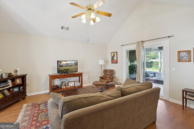 2507 Wateringhole Ct, Statesboro, GA 30458 - living area featuring high vaulted ceiling, ceiling fan, wood finished floors, and baseboards