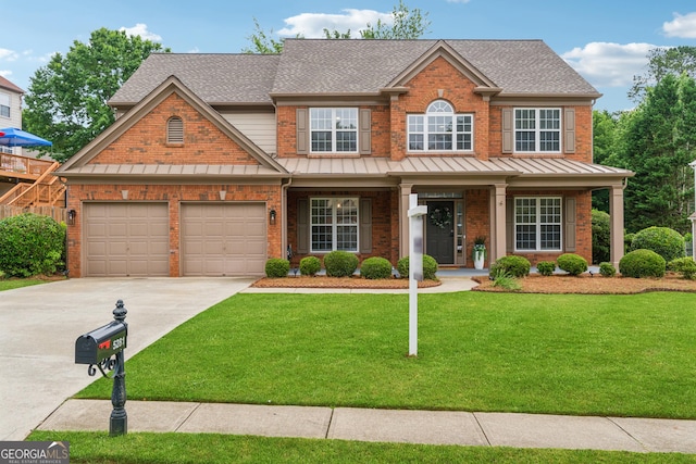 5281 Tormeall Trce, Suwanee, GA 30024 - view of front of property featuring a shingled roof, a standing seam roof, driveway, and an attached garage