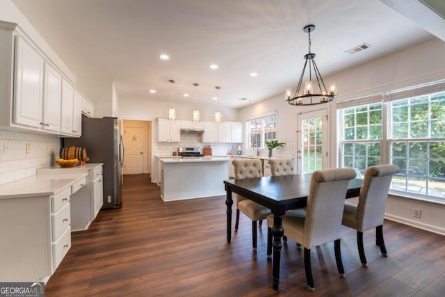5281 Tormeall Trce, Suwanee, GA 30024 - dining room featuring a chandelier, dark wood-style flooring, and recessed lighting