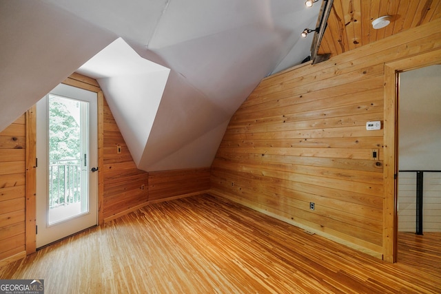 218 Wedgewood Dr, Danielsville, GA 30633 - bonus room featuring wooden walls, wood finished floors, and lofted ceiling