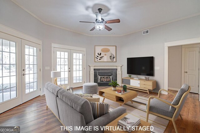 1443 Ebenezer Rd, Rincon, GA 31326 - living room featuring french doors, healthy amount of natural light, ceiling fan, wood finished floors, and ornamental molding