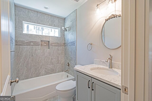 1443 Ebenezer Rd, Rincon, GA 31326 - bathroom featuring toilet, shower / bath combination, and vanity