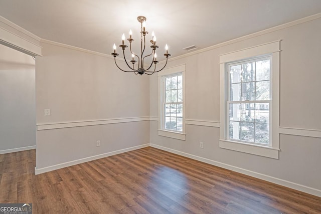 1443 Ebenezer Rd, Rincon, GA 31326 - empty room featuring a chandelier, ornamental molding, wood finished floors, and baseboards