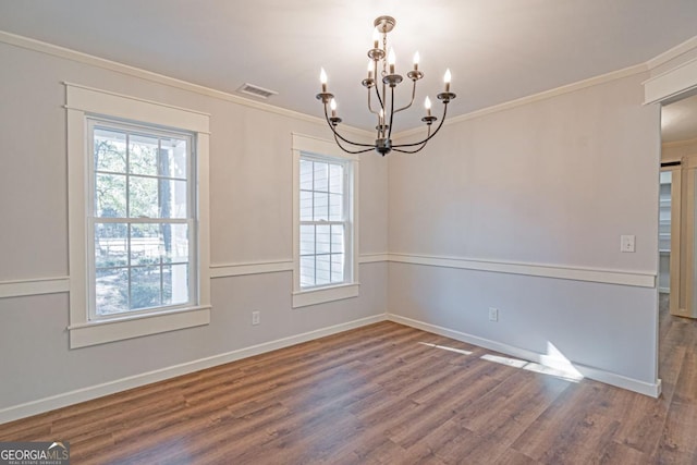 1443 Ebenezer Rd, Rincon, GA 31326 - spare room featuring a chandelier, ornamental molding, wood finished floors, and baseboards