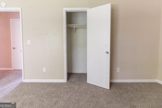 5339 Biffle Downs Rd, Stone Mountain, GA 30088 - unfurnished bedroom with carpet flooring and a closet