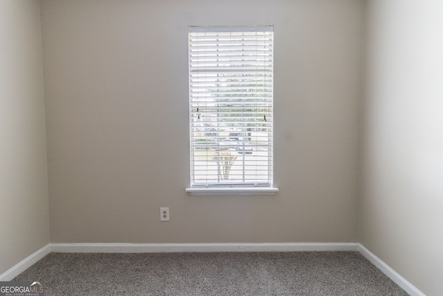 5339 Biffle Downs Rd, Stone Mountain, GA 30088 - unfurnished room featuring carpet flooring