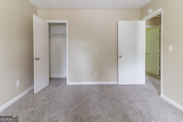5339 Biffle Downs Rd, Stone Mountain, GA 30088 - unfurnished bedroom with carpet flooring and a closet