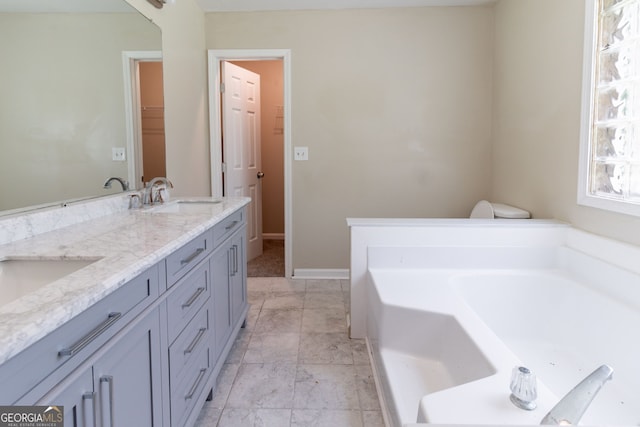 5339 Biffle Downs Rd, Stone Mountain, GA 30088 - bathroom with a garden tub, double vanity, and marble finish floors