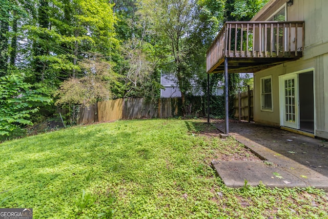 5339 Biffle Downs Rd, Stone Mountain, GA 30088 - fenced backyard featuring a wooden deck
