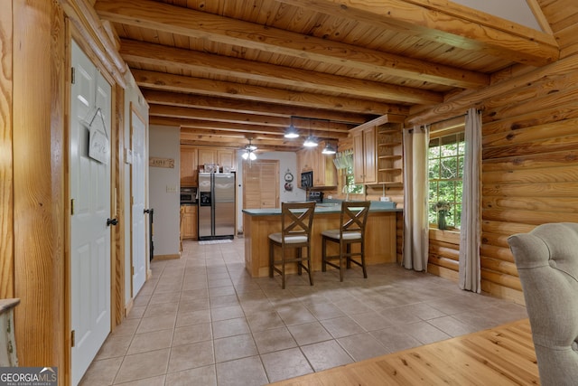 kitchen featuring stainless steel refrigerator with ice dispenser, open shelves, light tile patterned flooring, log walls, and a peninsula