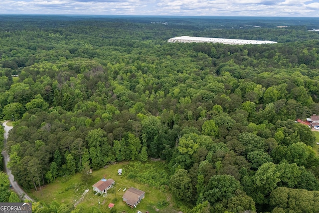 drone / aerial view of a heavily wooded area