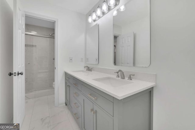 1025 Saint Marks Walk, Suwanee, GA 30024 - full bath with marble finish flooring, toilet, a stall shower, and double vanity